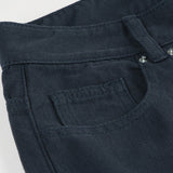 Pantalones cargo de pierna ancha con cintura baja y abertura con tachuelas