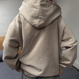 Sudadera con capucha y cremallera estilo streetwear vintage