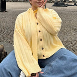 Chaleco de punto acanalado amarillo con cuello redondo