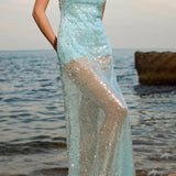 Vestido largo de lentejuelas con espalda abierta transparente y patchwork liso.