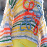 Blusa holgada de punto a rayas de colores