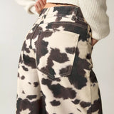 Vaqueros casuales con estampado de vaca vintage