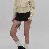 Chaqueta utilitaria con cinturón y cuello alto