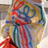 Blusa holgada de punto a rayas de colores