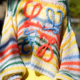 Blusa holgada de punto a rayas de colores
