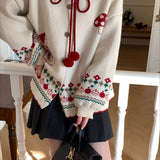 Chaleco oversize con pompones