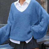 Blusa vintage de punto partido con cuello en V