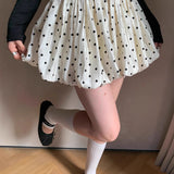 Minifalda retro de lunares con corte A y cintura elástica