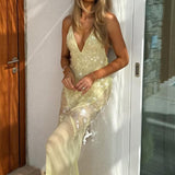 Vestido largo sirena con lentejuelas y escote en pico