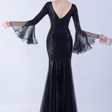 Vestido de noche con lentejuelas y volantes de tul