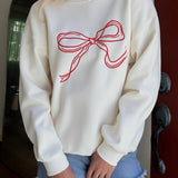 Blusa casual de cuello redondo, estilo suave y chic.