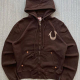 Sudadera vintage con remaches y cremallera.
