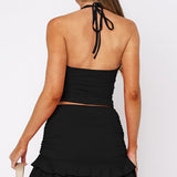 Conjunto de falda sexy ajustada con escote en V y recortes, camiseta sin espalda.