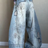 Vaqueros de pierna ancha con bordados de aguja