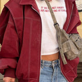Chaqueta con cremallera de piel sintética con bloques de color