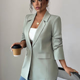 Blazer minimalista de manga larga