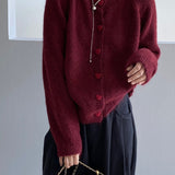 Cárdigan oversize con botones en forma de corazón y cuello redondo