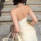 Vestido mini sexy, sencillo, sin tirantes, con espalda abierta y cintura ajustada.