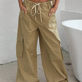 Pantalón cargo utilitario con cintura elástica, estilo americano