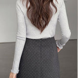 Falda trapecio de lana con lunares