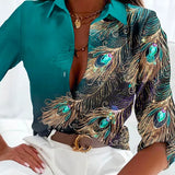 Blusa de mujer – Tejido de lujo – Corte entallado – Motivo de plumas con pedrería – Botones delanteros