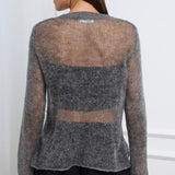 Blusa holgada de punto calado en mezcla de lana