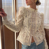 Blusa vintage de encaje con botones al frente