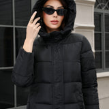 Chaqueta acolchada larga con capucha de talla grande