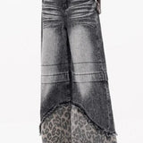 Vaqueros de pierna ancha con parches de leopardo