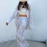Conjunto de dos piezas: camisa y pantalón retro floral.