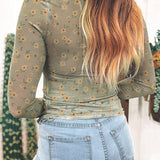 Blusa floral de manga larga, corte entallado