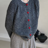Cárdigan oversize con botones en forma de corazón y cuello redondo