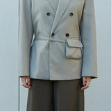 Blazer con cinturón estilo viajero