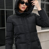 Chaqueta acolchada larga con capucha de talla grande