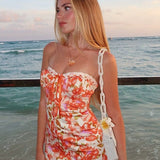 Vestido bandeau ajustado con estampado sexy para las fiestas.