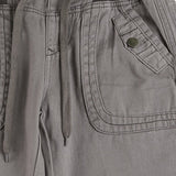 Vaqueros slim con tirantes patchwork, estilo rockero