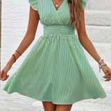 Vestido de mujer - Escote cruzado - Mangas con volantes - Cintura ajustada - Falda acampanada