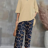 Conjunto elegante de top asimétrico y pantalón ancho con estampado floral para mujer