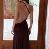 Vestido maxi sexy ajustado con espalda descubierta y detalles metálicos