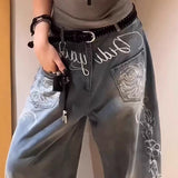 Vaqueros de pierna ancha bordados con letras florales Y2K
