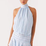 Elegante minivestido sin espalda en satén jacquard a rayas