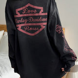 Sudadera vintage con estampado rosa descolorido