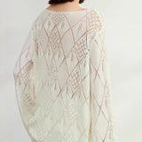 Blusa de punto jacquard con estampado de rombos
