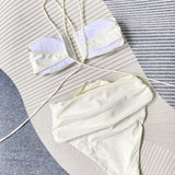 Bikini cuello halter con detalle floral - Elegante y cómodo