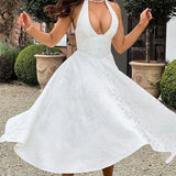 Vestido de noche jacquard con espalda abierta y escote en pico