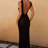 Vestido maxi ajustado, sexy y brillante, sin mangas y con espalda descubierta.