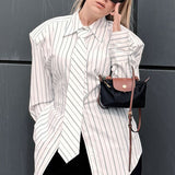 Blusa elegante de rayas con hombreras, estilo lazo y blusa elegante.