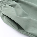 Pantalones cargo casuales de cintura alta y pierna ancha con cordón.