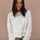 Blusa holgada con cuello redondo y volantes fruncidos