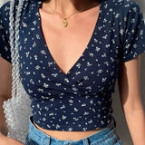 Top de mujer - Top corto ajustado - Cuello en V - Mangas cortas - Elegante estampado floral